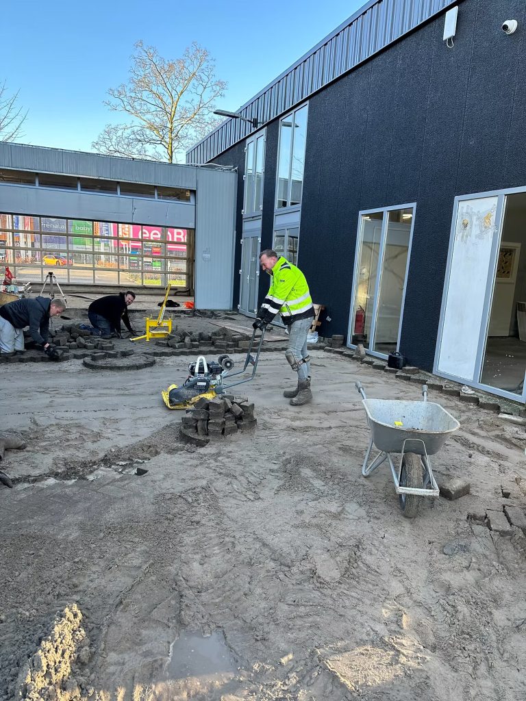 Aan het werk bij een vloeistofdichte vloer voor wasplaats in Amsterdam