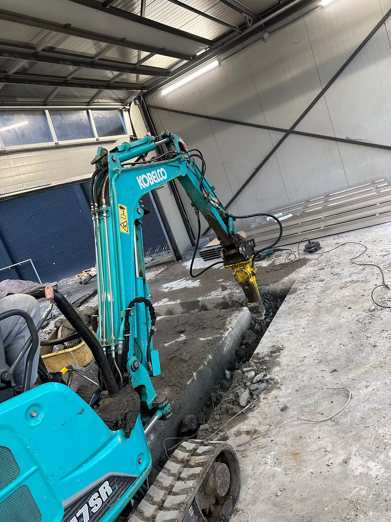 Werkzaamheden bij aanleg wasplaats op maat in Amsterdam