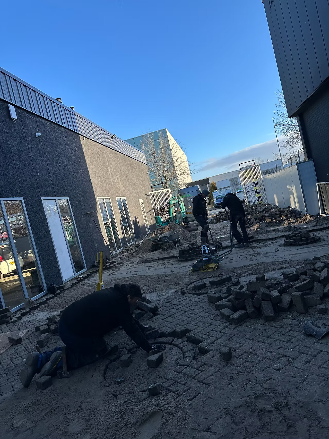 Werkzaamheden bij aanleg wasplaats op maat in Amsterdam