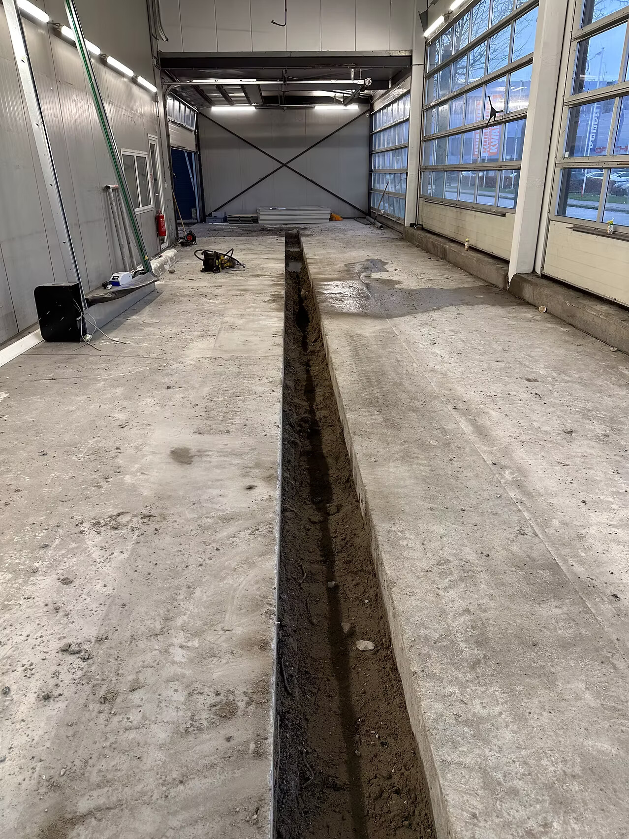 Werkzaamheden bij aanleg wasplaats op maat in Amsterdam